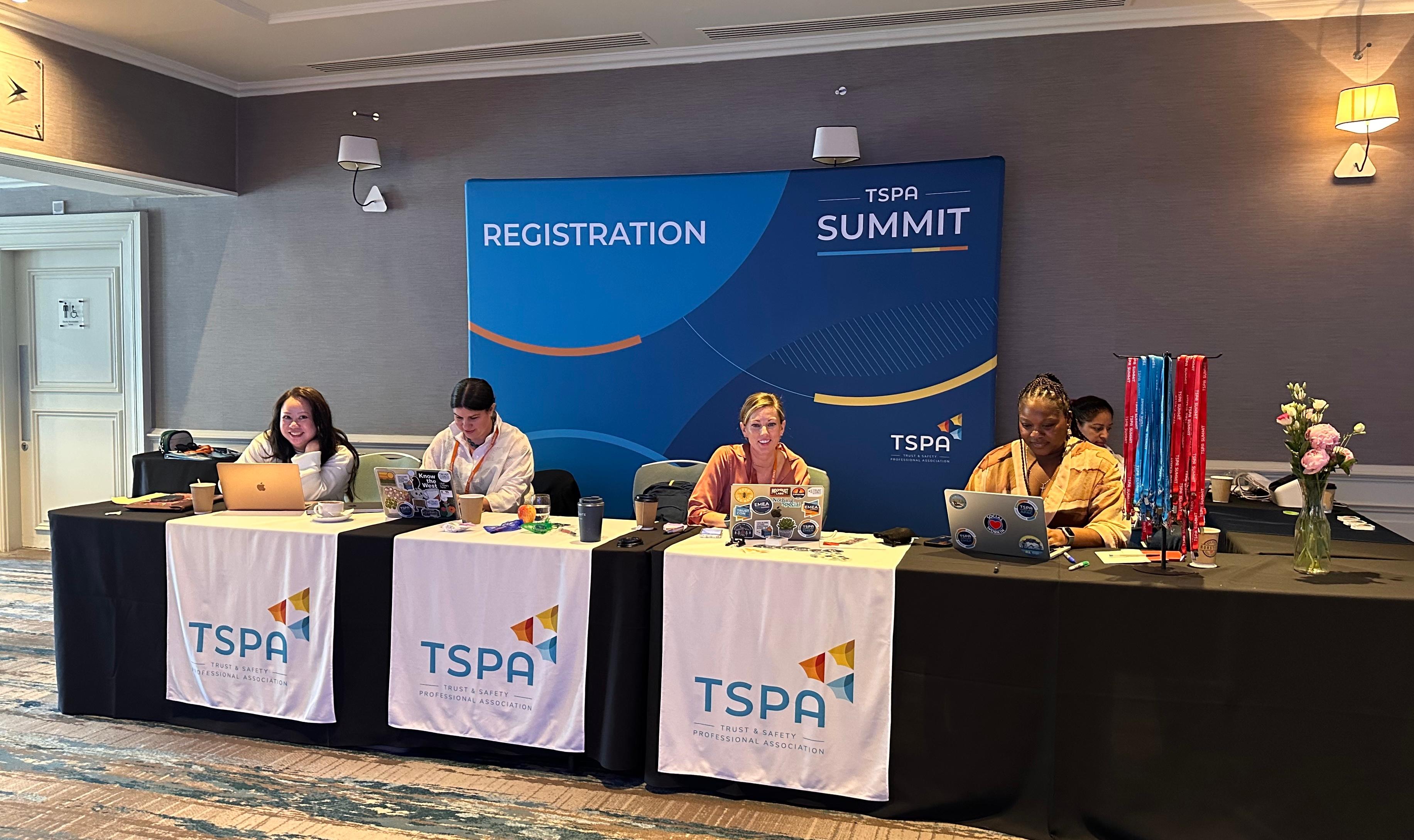 EMEA 2025 registration table with TSPA staff