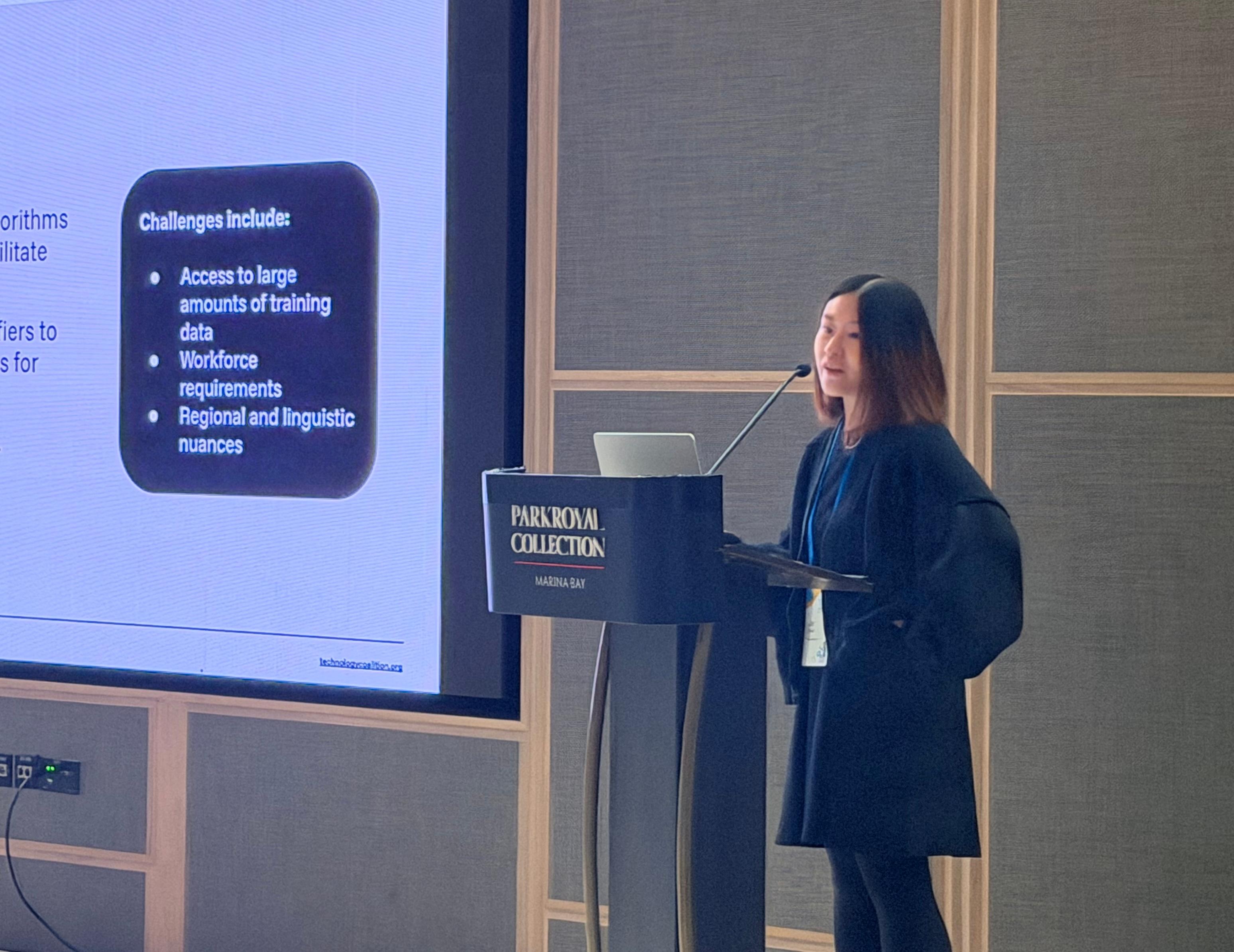 Presenter speaking at APAC Summit 2025.
